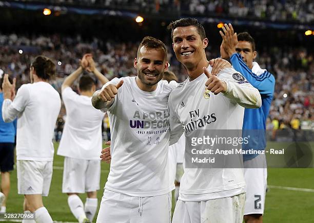 Jese Rodriguez and Cristiano Ronaldo of Real Madrid celebrate after the UEFA Champions League Semi Final second leg match between Real Madrid and...