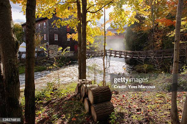 view of ulverton wool mill, eastern townships, quebec, canada. - eastern townships quebec stock pictures, royalty-free photos & images