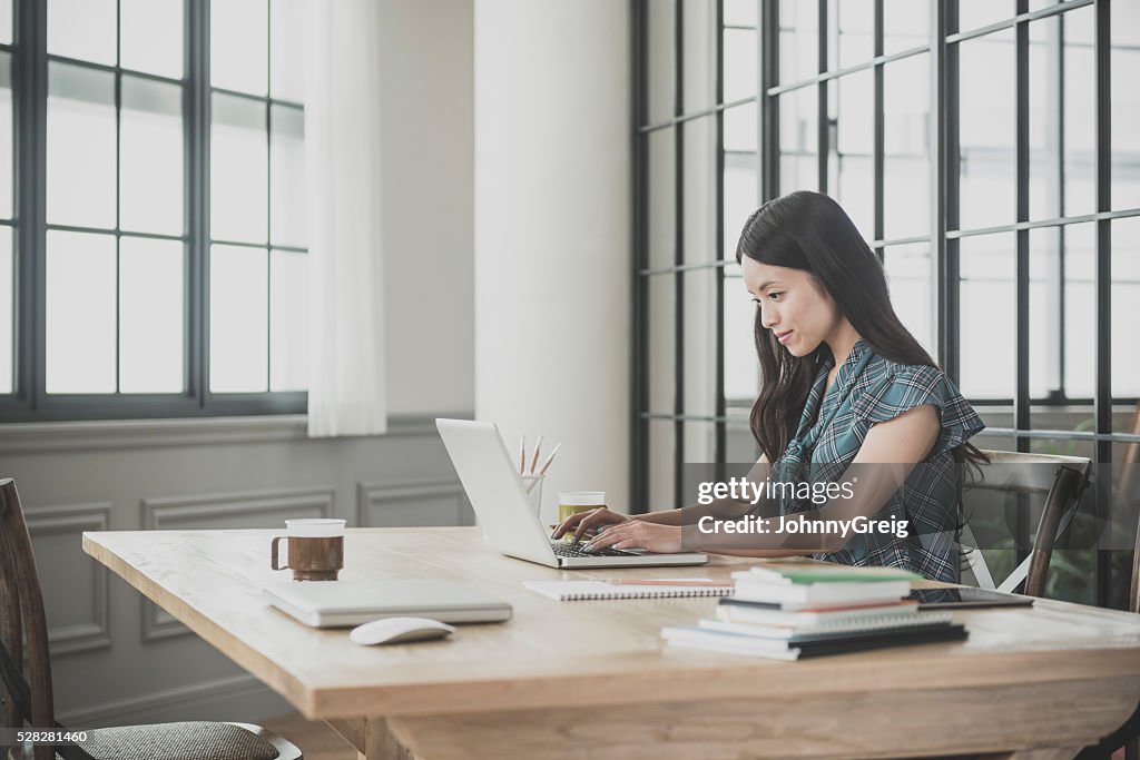 Woman using laptop