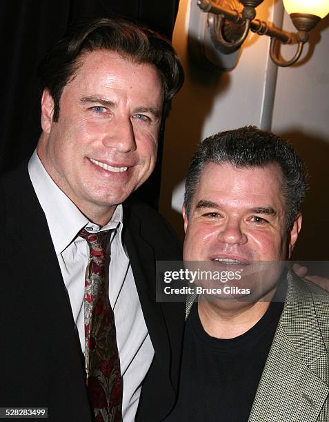 Actor John Travolta poses with actor Michael Badalucco when he visits The Rise of Dorothy Hale Off-Broadway at St. Lukes Theater on October 7, 2007...