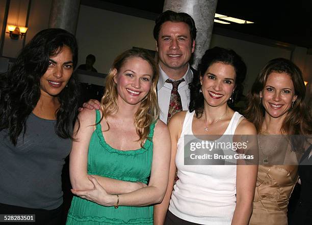 Actor John Travolta poses with Sarita Choudhury, Sarah Wynter, Laura Koffman and Kelly Preston when he visits The Rise of Dorothy Hale Off-Broadway...