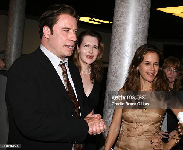 Actor John Travolta talks to the cast with playwright Myra Bairstow and Kelly Preston when he visits The Rise of Dorothy Hale Off-Broadway at St....