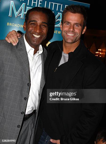 Actors Norm Lewis and Cameron Mathison pose as he visit backstage at Disney's The Little Mermaid on Broadway at The Lunt Fontanne Theater on December...