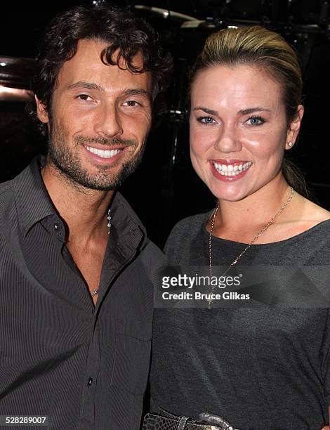 Alex Mazo and Natalie Coughlin pose backstage at Burn The Floor on Broadway at The Longacre Theater on October 26, 2009 in New York City.