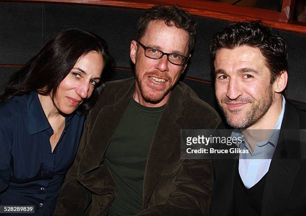 Film Editor Tricia Cooke, husband Playwright Ethan Coen and Actor Jonathan Cake pose during the opening night party for Ethan Coen's Almost an...