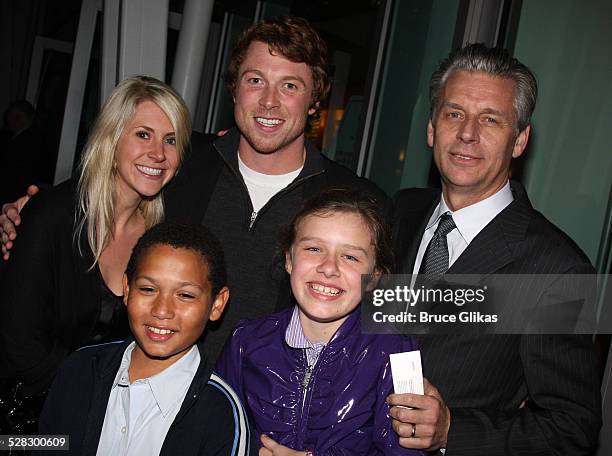 Artistic director of Center Theatre Group Michael Ritchie and family pose during the opening night party for the world premiere of 'Minsky's' held at...