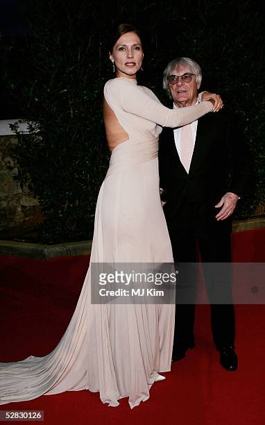 Formula One chief Bernie Ecclestone and wife Slavica arrive at the Laureus/Vogue welcome party on May 15, 2005 at Farol Design Hotel, Estoril,...