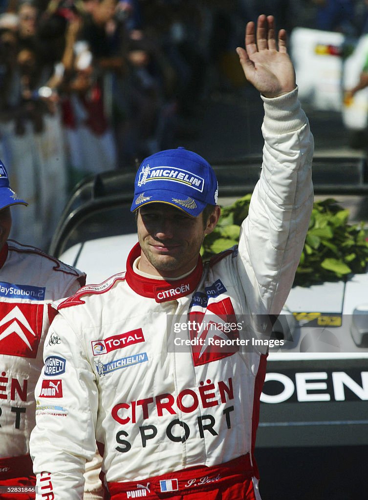 2001 Rally Cyprus Sebastien Loeb of France celebrates on the bonnet of his Citroen ...