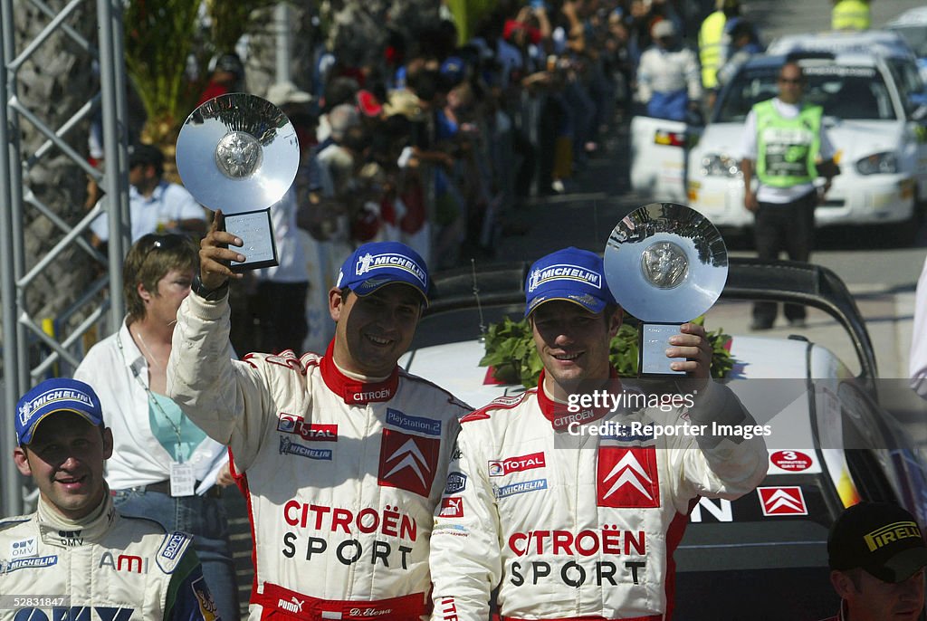 2001 Rally Cyprus Sebastien Loeb of France celebrates on the bonnet of his Citroen ...