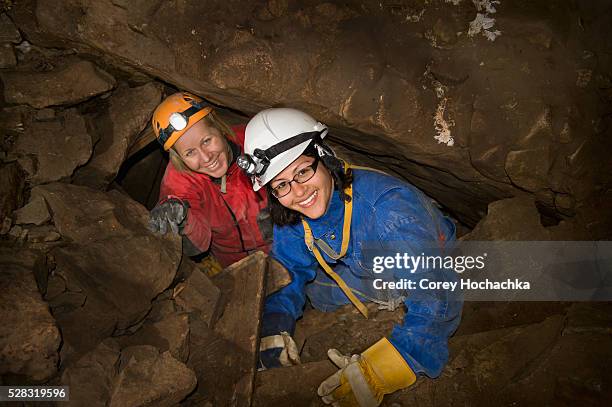 caving in the rocky mountains; canmore alberta canada - cave stock pictures, royalty-free photos & images