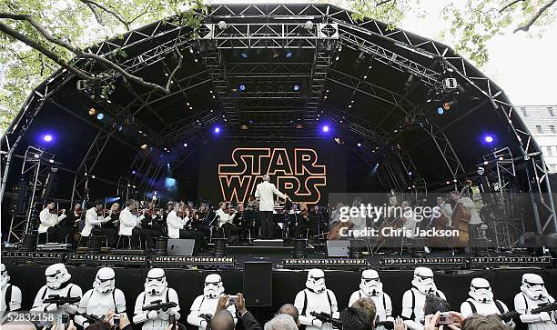 The Royal Philharmonic Orchestra performs the score to Star Wars in Leicester Square as fans celebrate the London premiere of the final part of the...