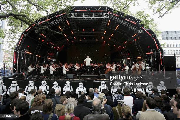 The Royal Philharmonic Orchestra performs the score to Star Wars in Leicester Square as fans celebrate the London premiere of the final part of the...