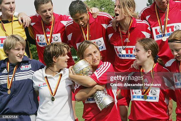 Frankfurt womens team celebrate winning the German Womens Football League championship after the Bundesliga match between 1.FFC Frankfurt and VFL...