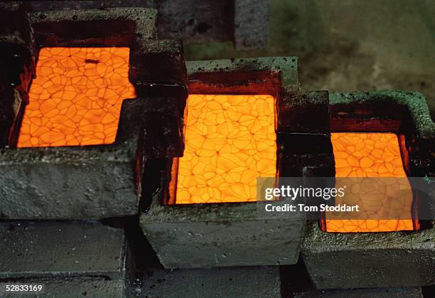 Newly poured gold at the Driefontein Gold Mine near Carltonville, South Africa. The mine is owned by Gold Fields Ltd. Who produce 4.3 million ounces...