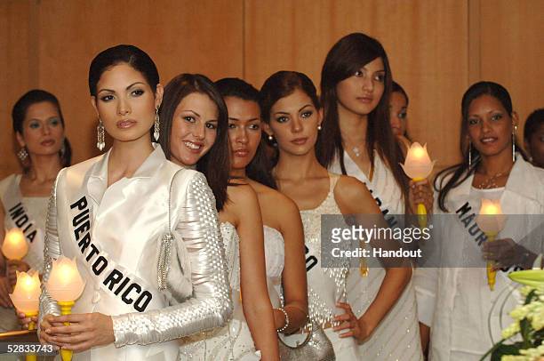 In this handout image provided by Miss Universe L.P., LLLP, Amrita Thapar, Miss India Universe 2005, Cynthia Olavarria, Miss Puerto Rico Universe...