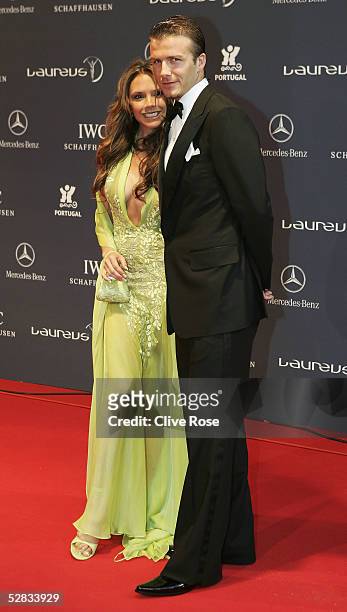 David and Victoria Beckham arrive at the Laureus World Sports Awards on May 16, 2005 at the Estoril Casino, Estoril, Portugal.