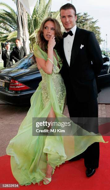 David and Victoria Beckham arrive at the Laureus World Sports Awards on May 16, 2005 at the Estoril Casino, Estoril, Portugal.