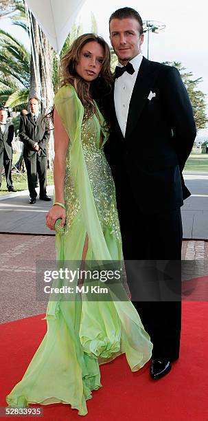 David and Victoria Beckham arrive at the Laureus World Sports Awards on May 16, 2005 at the Estoril Casino, Estoril, Portugal.