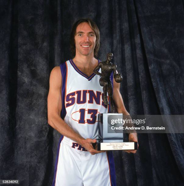Steve Nash of the Phoenix Suns poses with the Maurice Podoloff Trophy for the NBA's Most Valuable Player for the 2004-2005 season prior to Game one...