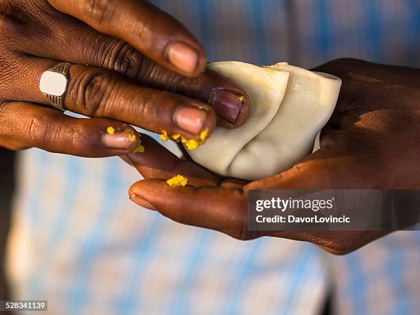 making samosa - samosa stock pictures, royalty-free photos & images