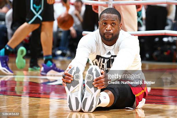 Dwyane Wade of the Miami Heat warms up before the game against the Charlotte Hornets during Game Seven of the Eastern Conference Quarterfinals during...