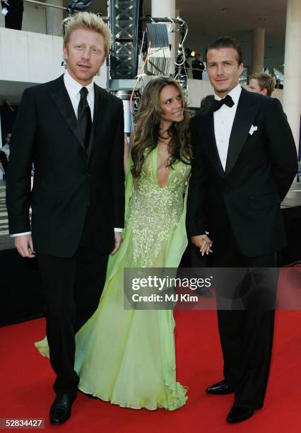 David and Victoria Beckham and tennis star Boris Becker arrive at the Laureus World Sports Awards on May 16, 2005 at the Estoril Casino, Estoril,...