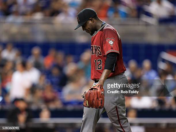 Rubby De La Rosa of the Arizona Diamondbacks reacts after being taken out of the game against the Miami Marlins during the sixth inning at Marlins...