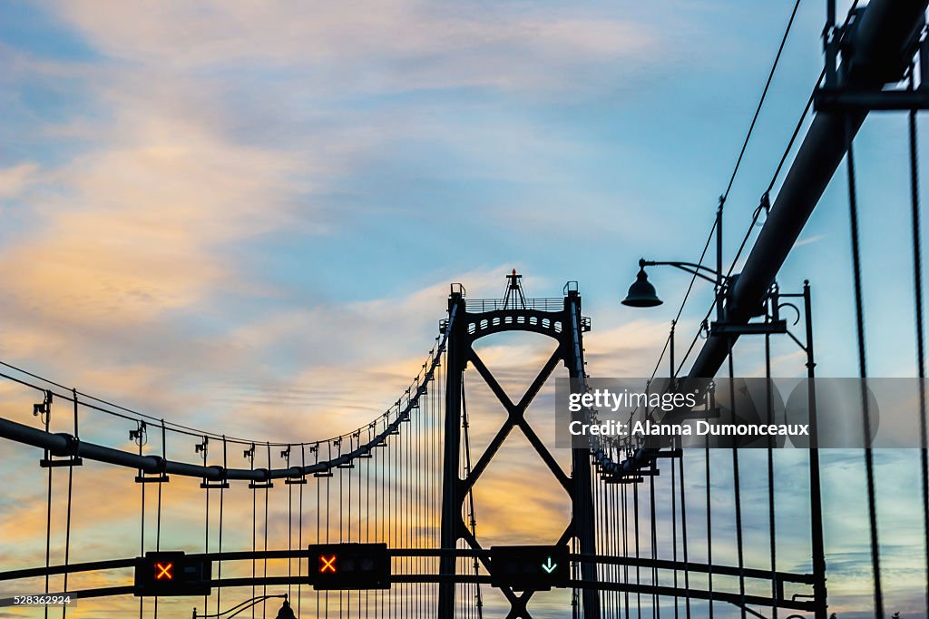 Bridge silhouette at sunset; Vancouver, British Columbia, Canada