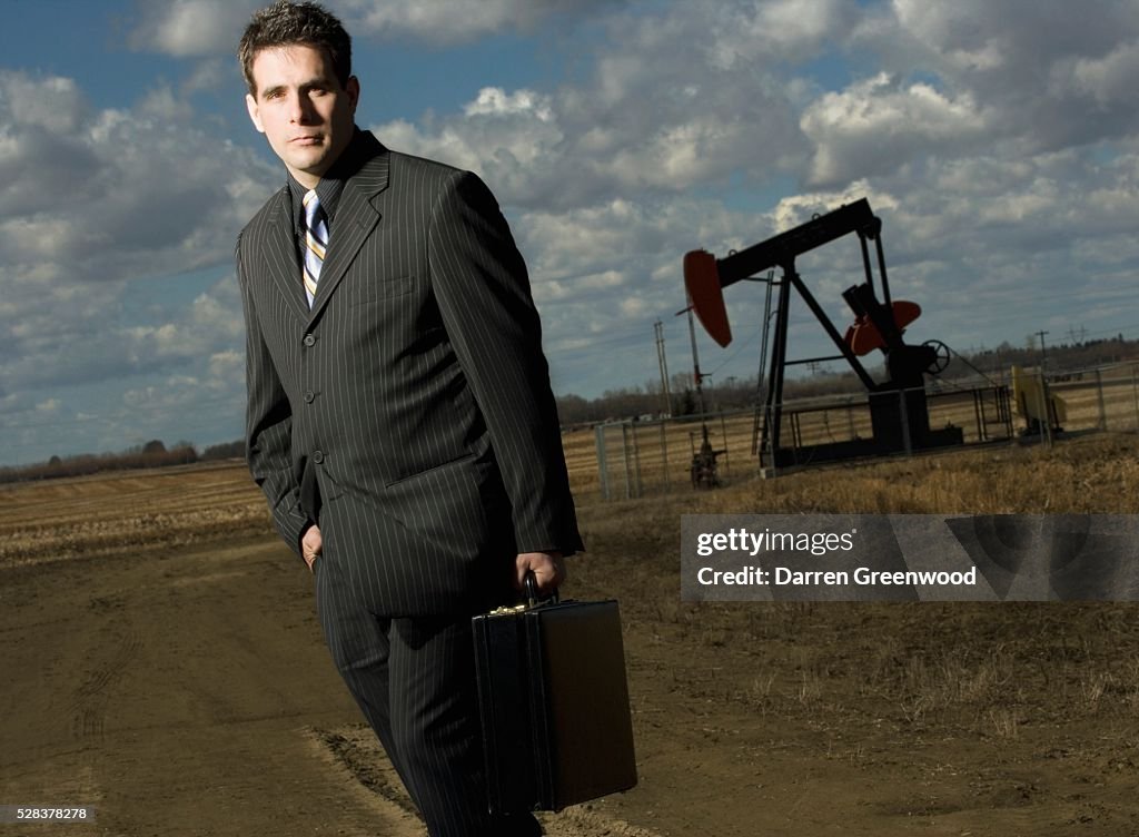 Man and oil rig