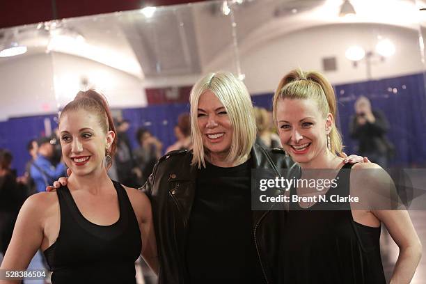 Assistant choreographer Katie Walker, director/choreographer Mia Michaels and director of Rockette creative Karen Keeler pose for photographs during...