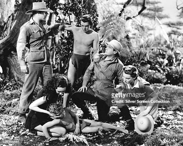 Johnny Weissmuller stars as Tarzan in 'Tarzan Finds A Son', directed by Richard Thorpe, 1939. Left to right: Henry Wilcoxon , Maureen O'Sullivan ,...