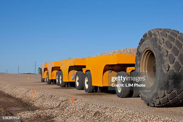 compacting equipment for new road construction; edmonton, alberta, canada - schrottpresse stock-fotos und bilder