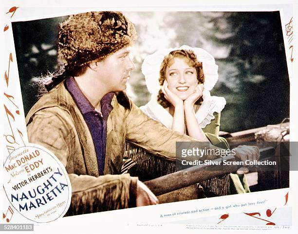 Poster for the musical film 'Naughty Marietta', directed by Robert Z. Leonard and W.S. Van Dyke, and starring Jeanette MacDonald and Nelson Eddy,...