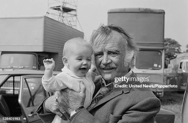 English actor John Mills pictured with his granddaughter Melissa Caulfield on set during filming of the science fiction television series Quatermass...