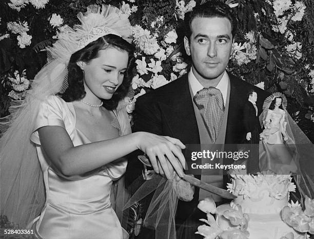 American heiress, artist, socialite, writer and fashion designer, Gloria Vanderbilt, with her first husband, agent and movie producer Pat DiCicco at...