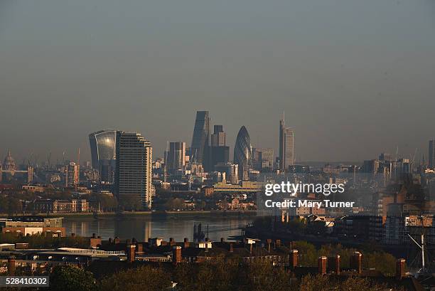 Haze of air pollution hangs over the London skyline in the early hours of the morning as London goes to the polls in its Mayoral elections, with all...