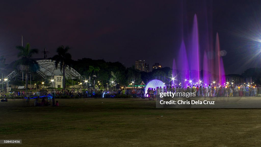 People watching Musical Dancing Fountain at Rizal Park