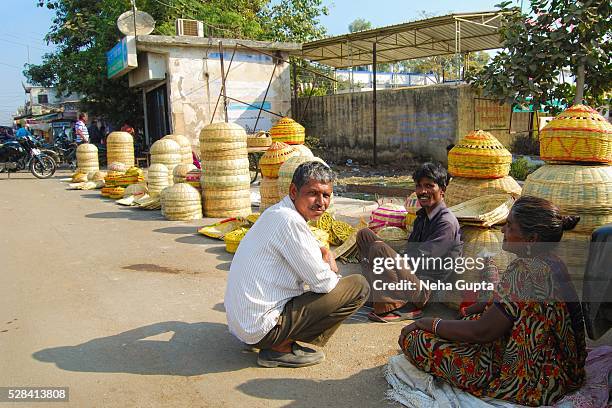 basket seller - damoh stock pictures, royalty-free photos & images