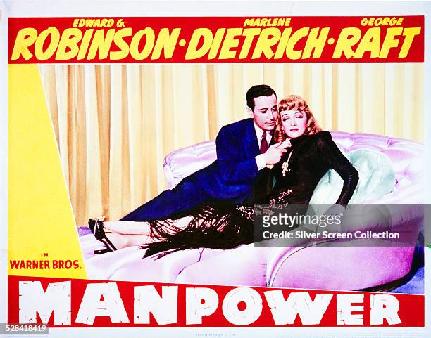 Lobby card for Raoul Walsh's 1941 drama, 'Manpower', featuring Marlene Dietrich and George Raft.