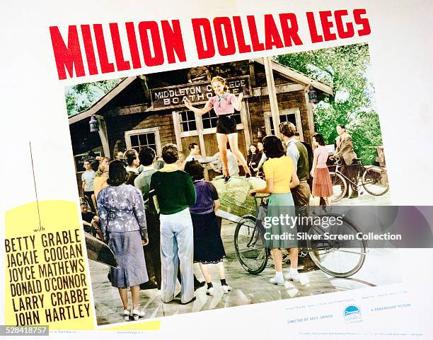 Lobby card for Nick Grinde and Edward Dmytryk's 1939 comedy 'Million Dollar Legs', starring Betty Grable.