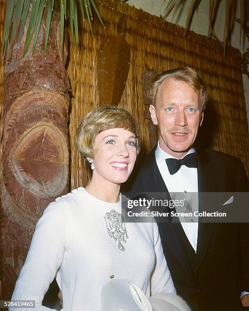English actress Julie Andrews and Swedish actor Max von Sydow at a party in Los Angeles, California, circa 1966.