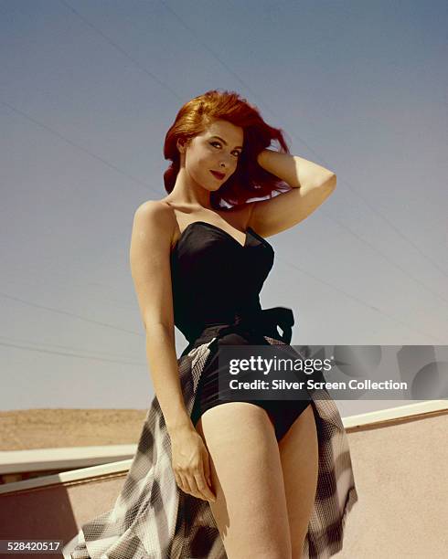 American actress and singer Tina Louise in a one-piece swimsuit, circa 1960.