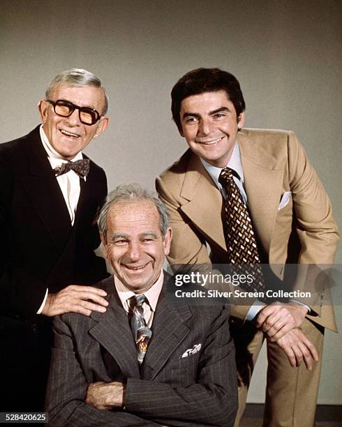 American comedian George Burns with American actors Walter Matthau and Richard Benjamin in a promotional portrait for 'The Sunshine Boys', directed...