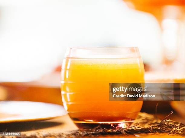raise a glass! - screwdriver drink stock pictures, royalty-free photos & images