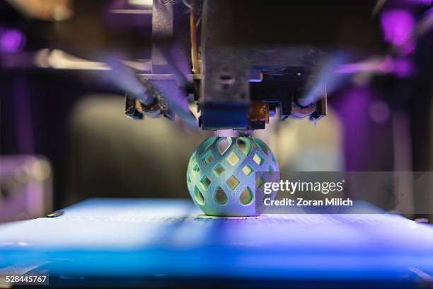 Printer making a plastic bowl.