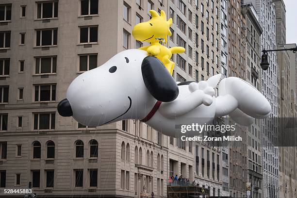 Snoopy balloon at the Macy's 2014 88th Thanksgiving Day Parade. The Manhattan Borough of New York, New York, USA.
