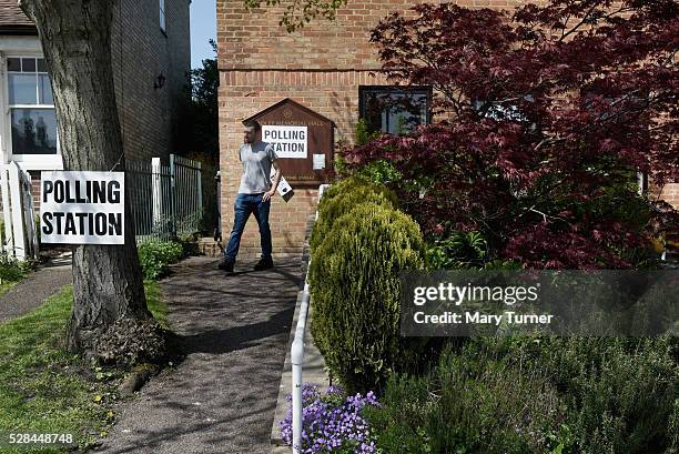 Young man leaves a polling station in Chipping Barnet, North London after being unable to vote due to registration problems on May 5th 2016 in...