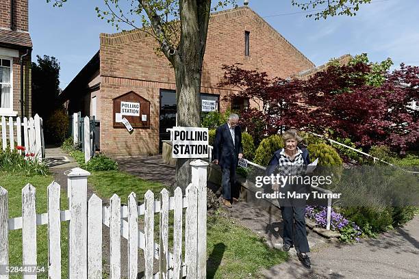 An elderly couple leave a polling station in Chipping Barnet, North London on May 5th 2016 in London, United Kingdom. A large number of people have...