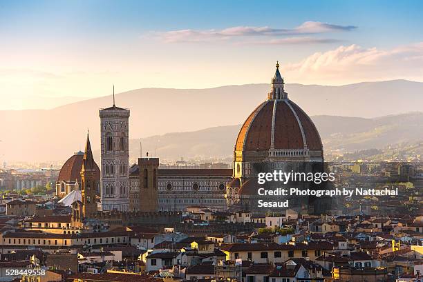 florence's cathedral and skyline at sunset - giotto di bondone stock pictures, royalty-free photos & images