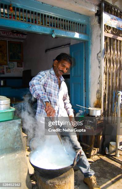 milk seller - damoh stock pictures, royalty-free photos & images